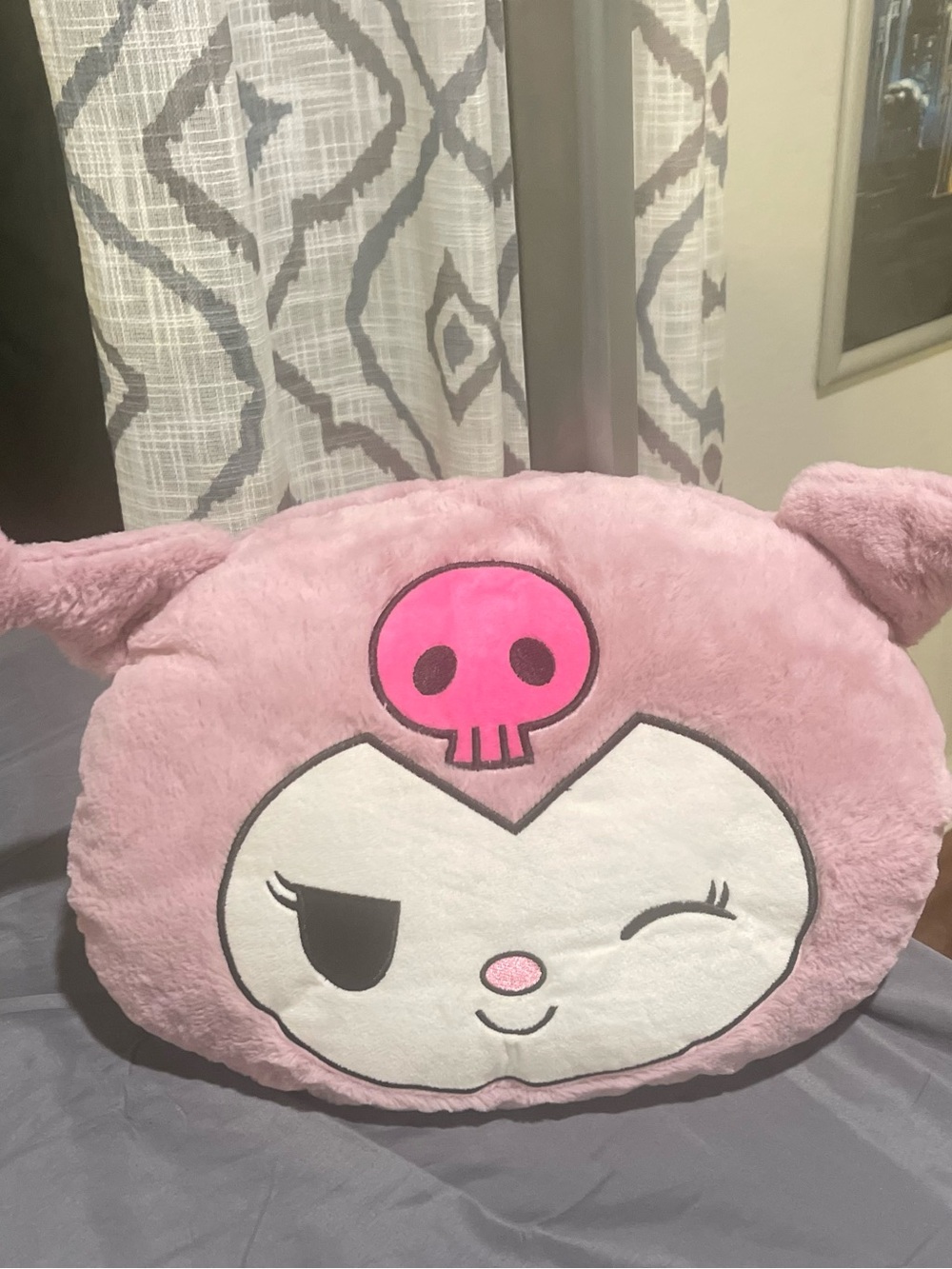Plush Pink Character Accent Pillow with Skull Motif